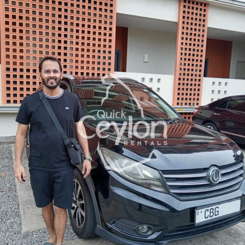 Home 20 Happy customer enjoying a self-drive car rental in Sri Lanka with Quick Ceylon Rentals