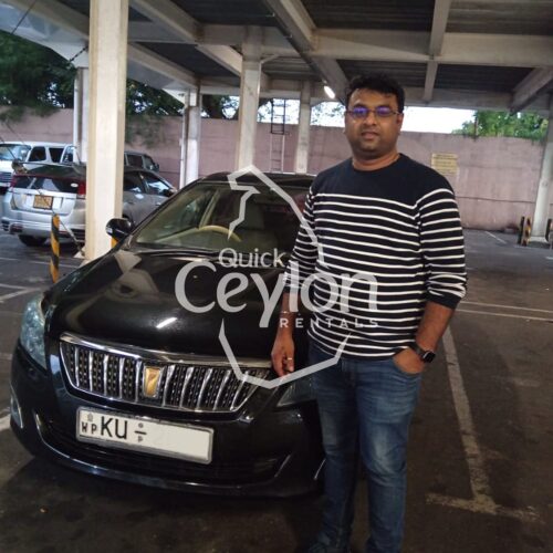 Home 28 Happy customer enjoying a self-drive car rental in Sri Lanka with Quick Ceylon Rentals