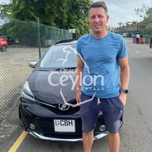 Home 27 Happy customer enjoying a self-drive car rental in Sri Lanka with Quick Ceylon Rentals